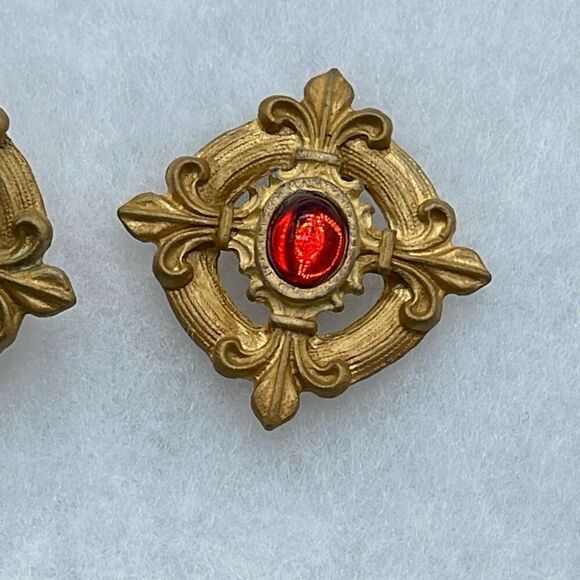 Vintage Fleur de lis gold tone metal red glass clip earrings. - Picture 2 of 7